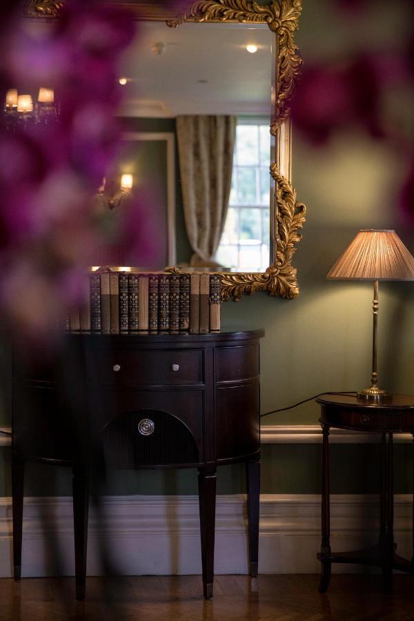 Castlemartyr Resort Hotel Екстер'єр фото A photograph of a room with a green wall